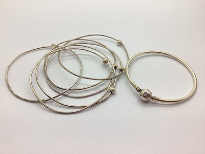 Lot 182 - Modern Bangles, stamped "925", with textured...