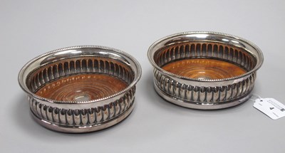 Lot 4 - A Pair of Plated on Copper Bottle Coasters,...