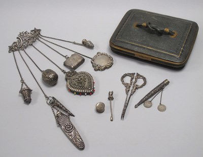 Lot 17 - A XIX Century Chatelaine, the shaped scroll...