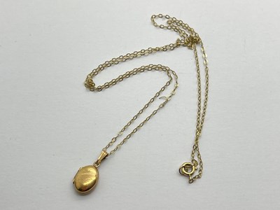 Lot 276 - A 9ct Gold Locket Pendant, initial engraving...