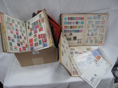 Lot 1403 - Stamps, Three well filled albums of GB & World,...