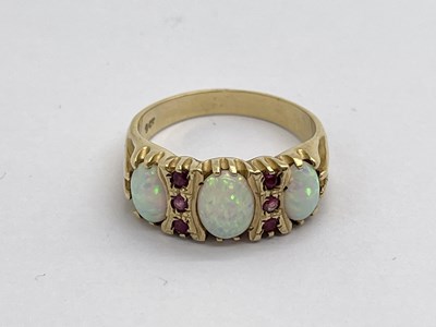 Lot 312 - A Victorian Style Three Stone Ring, the oval...