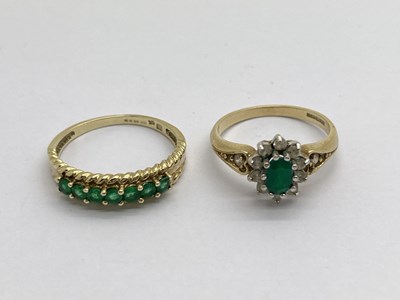 Lot 317 - A 9ct Gold Floral Cluster Ring, between stone...