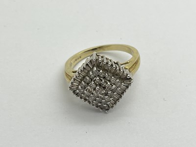 Lot 323 - A Modern 9ct Gold Diamond Set Ring, the round...