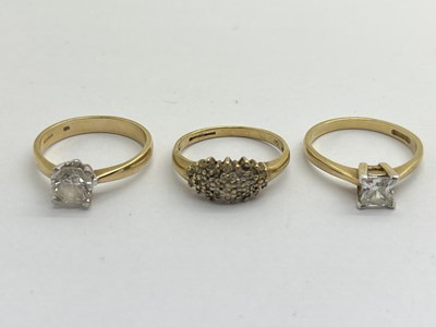 Lot 333 - A 9ct Gold Round Single Stone Ring, together...