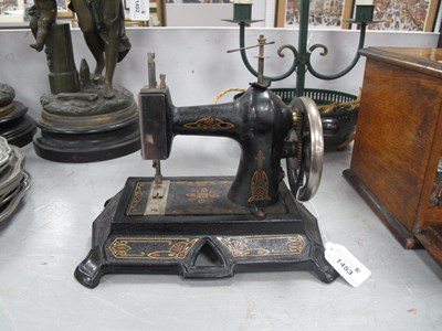 Lot 1453 - A Child's / Miniature Sewing Machine, cast...