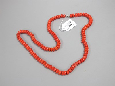 Lot 231 - A Modern Single Strand Coral Bead Necklace,...