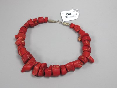 Lot 230 - A Graduated Raw Red Coral Bead Necklace, with...