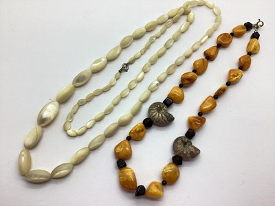 Lot 193 - An Amber Coloured Single Strand Bead Necklace,...