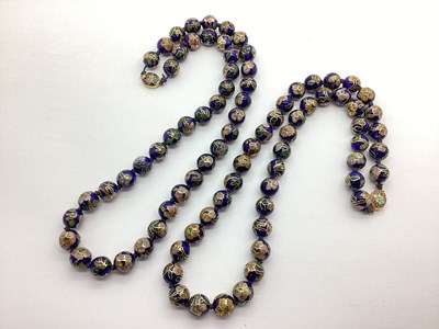 Lot 258 - A Cloisonné Bead Necklace, floral on a blue...