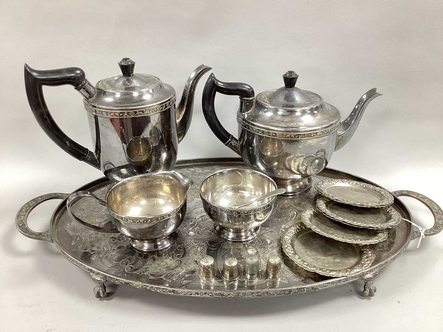 Lot 10 - A Plated Four Piece Tea Set, together with