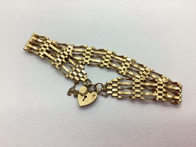 Lot 212 - A 9ct Gold Gate Link Bracelet, to heart-shape...