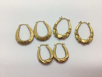 Lot 229 - Three Pairs of Creole Style Hoop Earrings,...