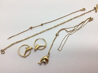 Lot 214 - A Dainty Two-Tone Dolphin Pendant Necklace,...