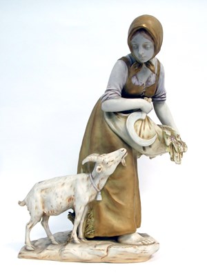 Lot 1176 - A Royal Vienna Pottery Model of a Lady Holding...