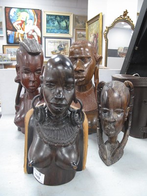 Lot 1449 - Carved wooden African busts of female form,...