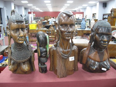 Lot 1443 - Carved wooden African busts of female form,...