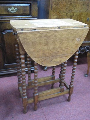 Lot 1624 - Oak Oval Topped Table, with drop leaves and...