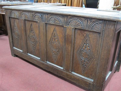 Lot 1568 - A XVII Century Oak Coffer, four panel lozenge...