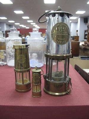 Lot 1448 - Miners Lamp by Protector Lamp & Co Eccles,...