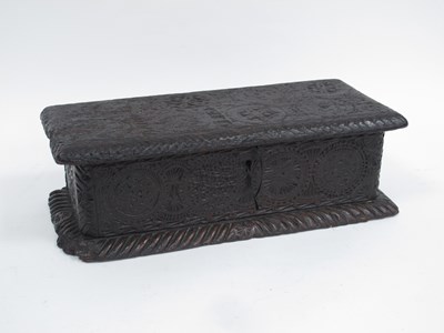 Lot 1322 - A XVII Century Box, with a hinged cover carved...