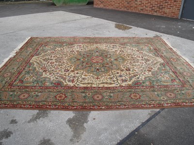 Lot 1591 - Wool Tassled Carpet, with allover floral...