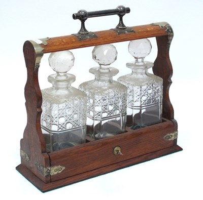 Lot 1275 - An Early XX Century Oak Cased Tantalus, with...