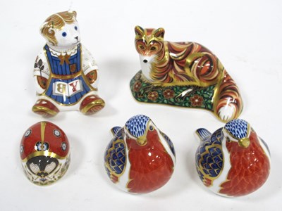 Lot 1165 - Five Royal Crown Derby Porcelain Paperweights,...