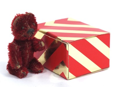 Lot 1309 - A Schuco Bear, in red mohair, with moveable...