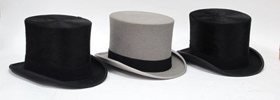 Lot 1125 - Lincoln Bennett Grey Top Hat, others in black...