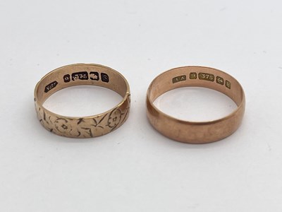 Lot 312 - Two 9ct Gold Bands, including allover etched...