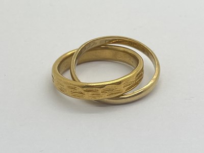 Lot 309 - An Interlinked Wedding Band, comprising 9ct...