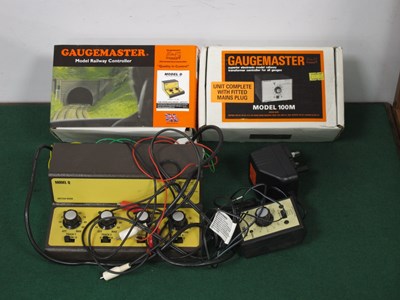 Lot 555 - Three Gaugemaster Control Units, an unboxed...