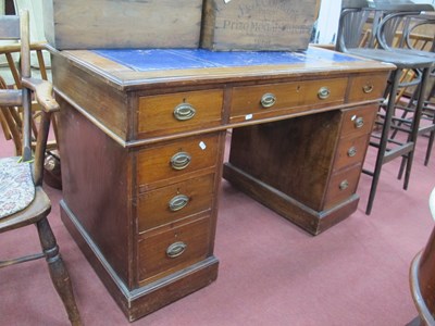 Lot 1547 - Early XX century walnut pedestal desk...