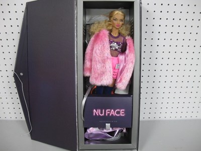 Lot 335 - A Boxed Integrity Toys The Nu.Face Counter...