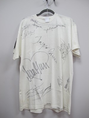 Lot 1396 - A 1985's 'Fashion Aid' T-Shirt, signed in felt...