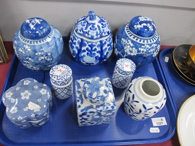 Lot 1327 - Chinese blue and white ginger jars, covers and...