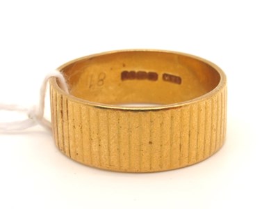 Lot 186 - A 22ct Gold Patterned Wedding Band, of...