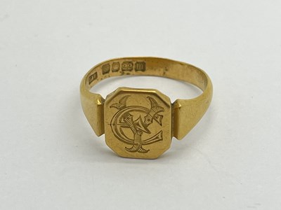 Lot 320 - A 22ct Gold Signet Ring, engraved with...