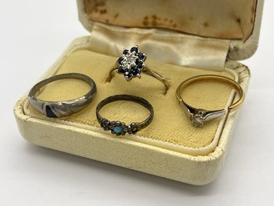 Lot 348 - A Stone Set Floral Cluster Ring, illusion set...