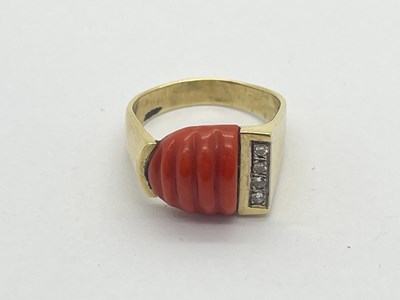 Lot 337 - An Art Deco Style Coral Set Ring, of reeded...