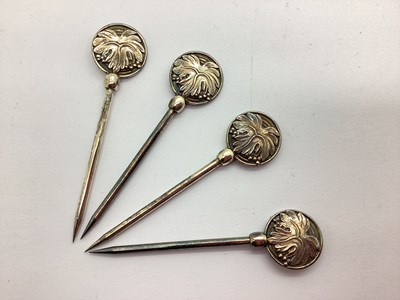 Lot 167 - Four Christofle Vinea Pattern Cocktail Picks. (4)