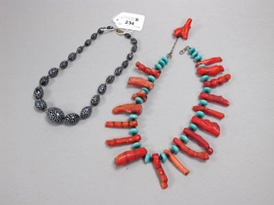 Lot 234 - A Red Coral and Turquoise Necklace, 41cm long;...