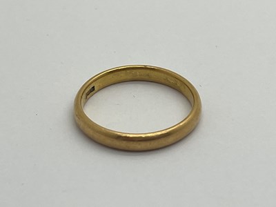 Lot 317 - A Plain Wedding Band, stamped "22ct" (finger...