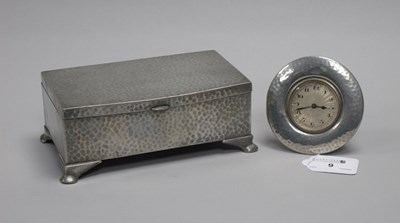 Lot 9 - A Tudric Pewter Bedside Clock, the engine...
