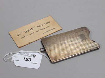 Lot 123 - A Hallmarked Silver The "Grip" Note Case,...