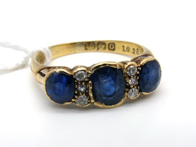 Lot 184 - An 18ct Gold Sapphire and Diamond Ring,...