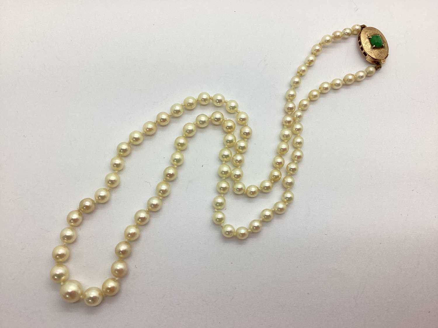 Lot 203 - A Single Strand Graduated Pearl Bead Necklace,...