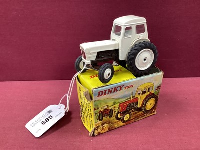 Lot 685 - Dinky Toys No 305 David Brown Tractor, white,...