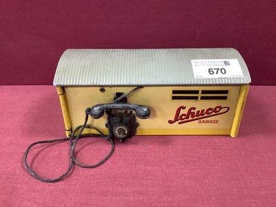 Lot 670 - An Original Schuco Tinplate Clockwork Car, one...